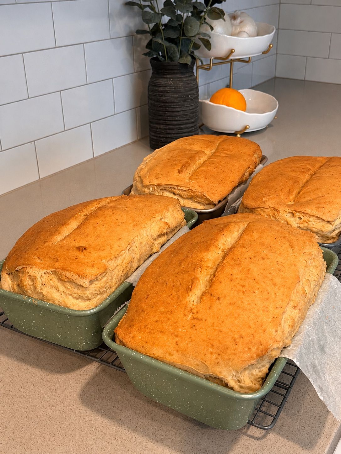 Freshly baked sourdough loaves cooling in Dionne's home kitchen